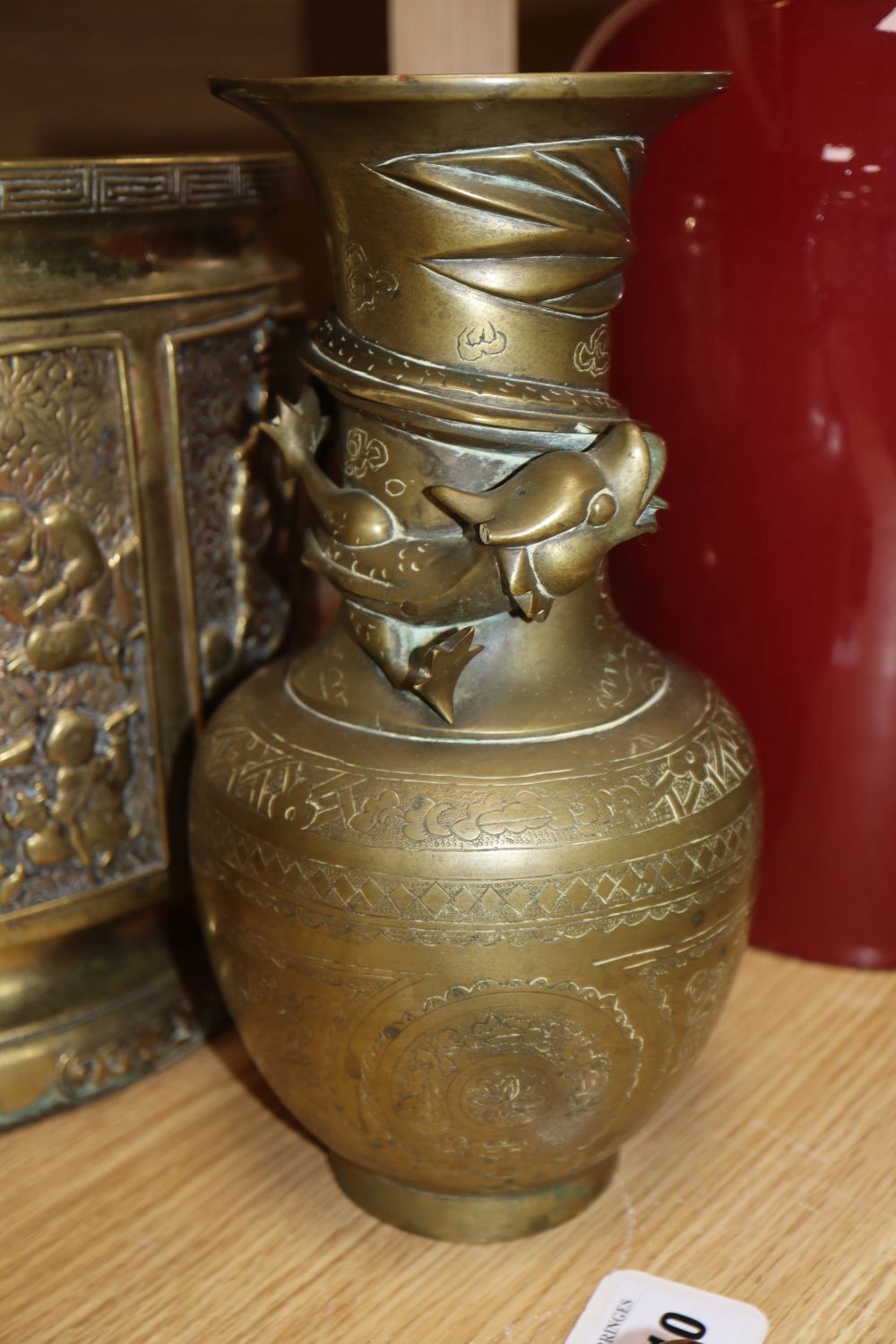 Two Chinese bronze vases and a jardiniere, tallest vase 37cm